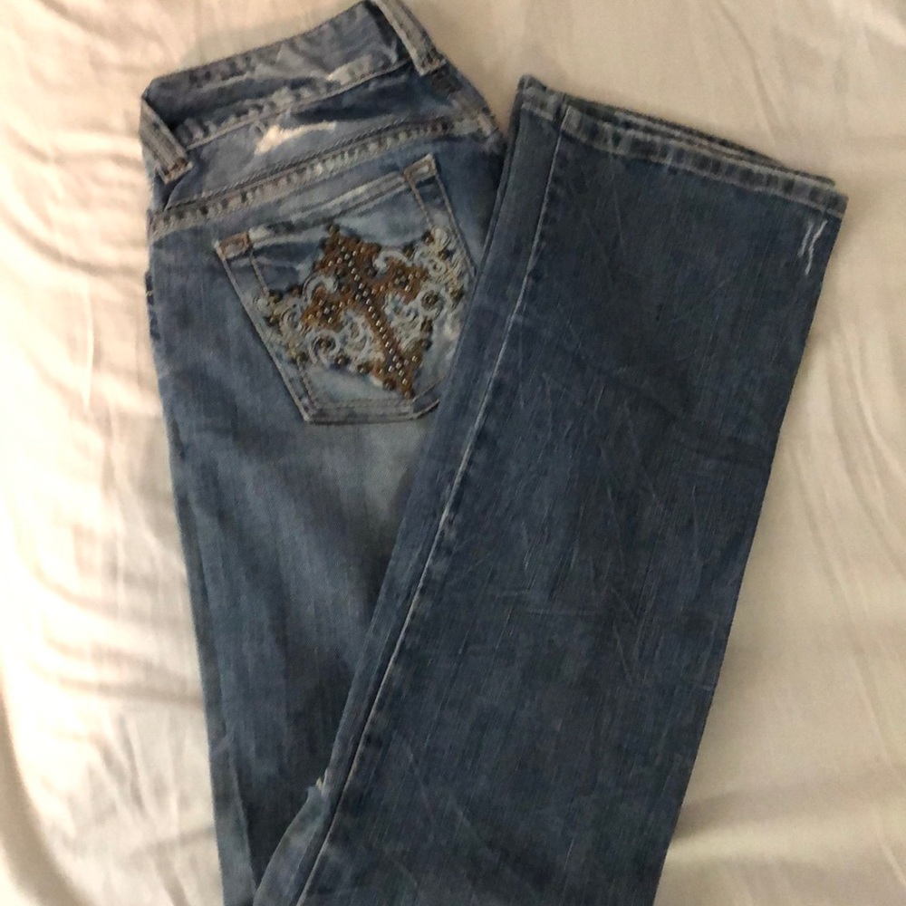 Guess distressed boot cut jeans, studded pockets